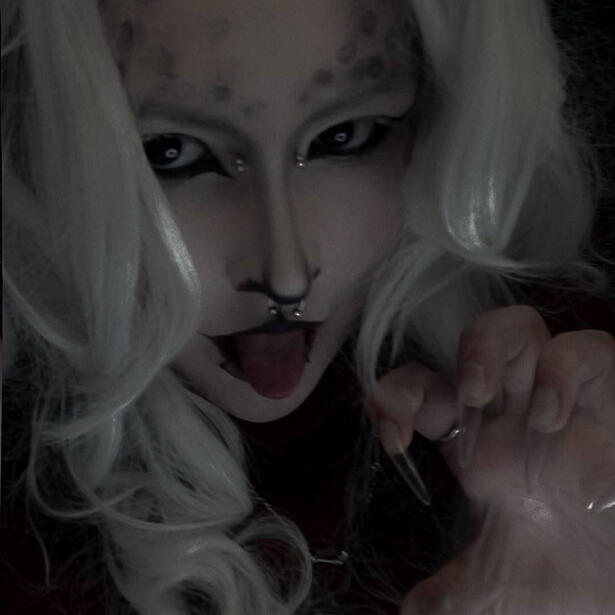 A picture of the nail artist behind the Nail Necromancy business.
